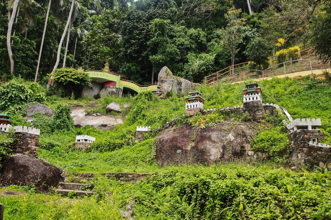 Miniature shrines in the hillside garden of Fu Lin Kong Temple, Pangkor